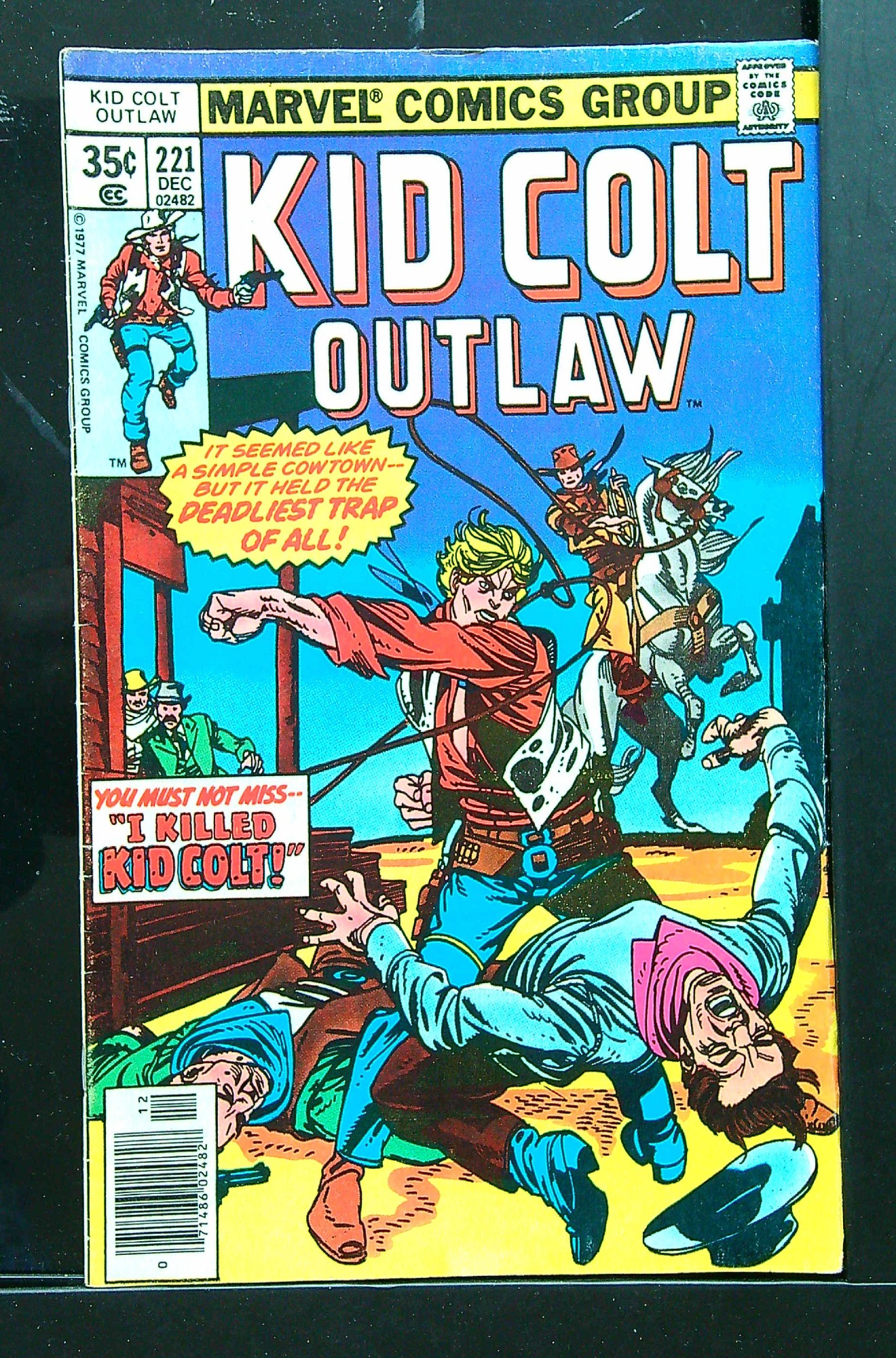 Cover of Kid Colt Outlaw #221. One of 250,000 Vintage American Comics on sale from Krypton!
